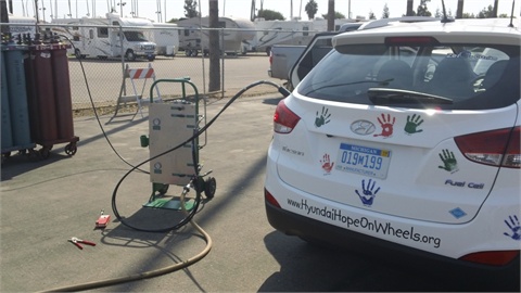 The Hyundai FCEV Tucson stops to fuel up during Drive 4 Hope.
