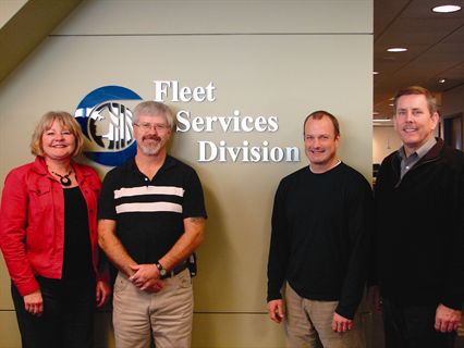 Seattle’s fleet team includes (l-r) Nanci Lien, fleet administration manager; Ken Bailey, vehicle maintenance director; Chris Wiley, Green Fleet coordinator; and Dave Seavey, Fleet Services director.
