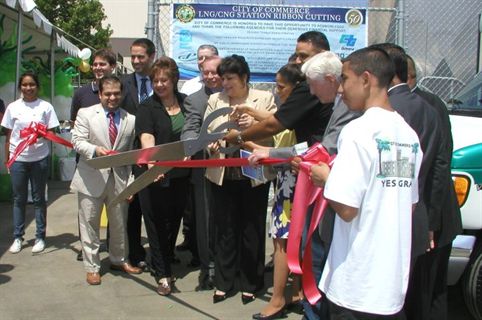 City of Commerce Mayor Tina Baca Del Rio (center), city officials, and representatives from industry groups that supported the station cut the ribbon during the CNG/LNG grand-opening ceremony.